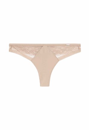 Culotte string beige avec un devant lisse et des accents en dentelle à l'arrière, dotée d'un panneau rectangulaire au centre.