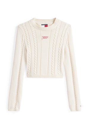 Kremfarget cropped genser med kabelstrikk mønster, ribbede mansjetter og halslinning. Rød "tommy jeans" logo på forsiden. Myk, strukturert stoff.