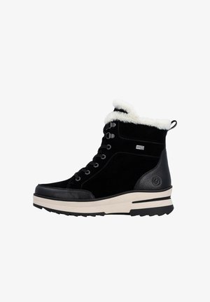 Black suede ankle boot with white faux fur cuff, metal eyelets, and cream platform sole. Features textured leather accent and pull tab.