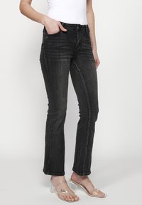 Koroshi Vaqueros bootcut - denim black