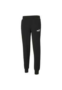 Czarne dresy z tapered designem, elastycznym pasem, ściągaczami i białym logo Puma na lewym udzie.