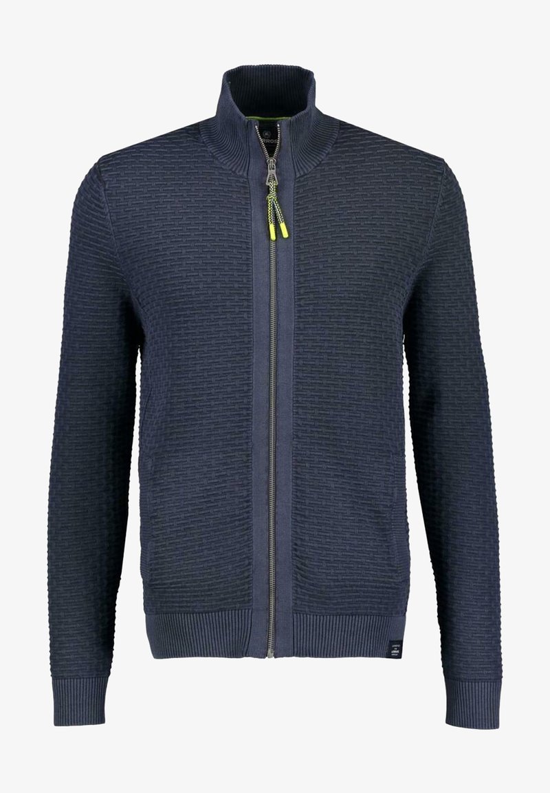 Marinblå zip-up tröja med en strukturerad vävstruktur, ribbade ärmslut och nederkant, samt en kontrasterande gul dragkedjehandtag.