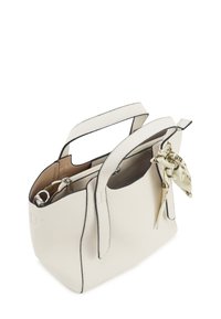 White pebbled leather handbag with contrasting black trim, two top handles, and a decorative cream scarf tied at the side.