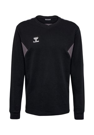 Schwarzes Sportlangarmshirt mit grauen Seitenpaneelen, Rundhalsausschnitt, gerippten Bündchen und weißem Hummel-Logo auf der linken Brust.