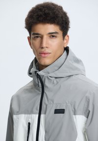 Icepeak Regenjacke wasserabweisende Jacke puder/nude Zalando