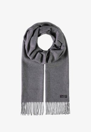 Szary szalik z miękkiego materiału, o luźnym fasonie i frędzlami na końcach. W pobliżu frędzli widoczna jest mała metka z logo.