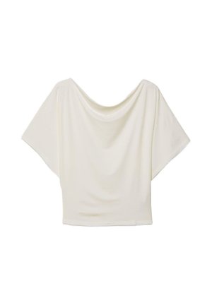 Haut blanc ample à manches courtes avec un large col bateau et un tissu doux drapé dans une coupe décontractée.