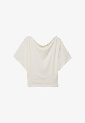 Haut blanc ample à manches courtes avec un large col bateau et un tissu doux drapé dans une coupe décontractée.