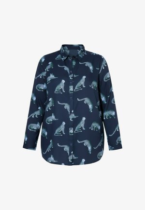 Laivastonsininen pitkähihainen napillinen paita, jossa on toistuva kuvio valkoisista ja vihreistä täplikkäistä leopardeista eri asennoissa.