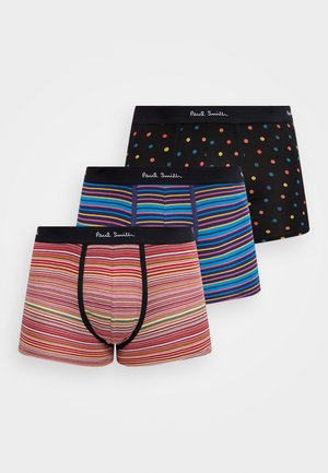 Trois boxers pour hommes avec ceintures noires, l'un avec de fines rayures multicolores, un autre avec des rayures bleu vif et orange, et un noir avec des pois colorés.