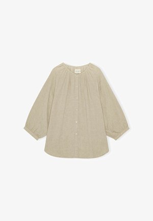 Bež bluzica od lana s okruglim izrezom, dugmetima sprijeda i nabranim detaljima. Ima duge, napuhane rukave i opušteni kroj.