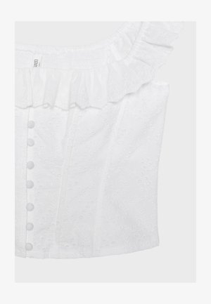 White sleeveless blouse with ruffled neckline, fabric-covered buttons down front, and subtle floral eyelet embroidery pattern.