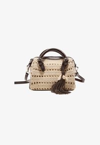 Sélectionné, beige