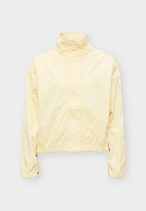 Puma, TROPICAL SPEED MOTO JACKET - Αντιανεμικό μπουφάν - buttercream