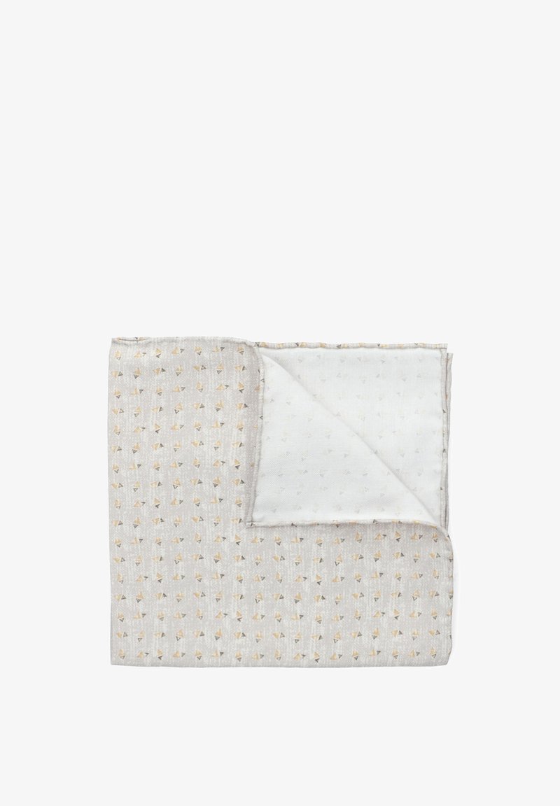 Koc bawełniany z jasnoszarym, teksturowanym powierzchnią w żółte i czarne trójkątne wzory oraz jednolitym białym spodem.