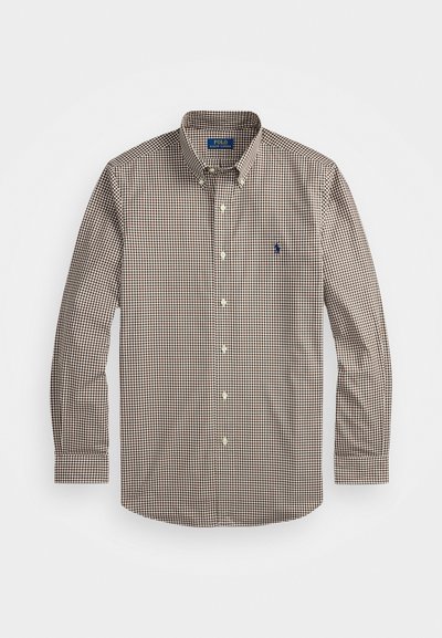 Brown and white checked long-sleeve shirt with a button-down collar, featuring a blue embroidered logo on the chest. Cotton material.