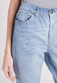 Urban Classics LADIES HIGH WAIST SLIM JEANS - Vaqueros slim fit - authentic blue wash
