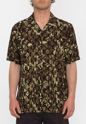 Short-sleeve shirt in dark brown fabric featuring a bold yellow and brown abstract pattern; button-up front with two buttons visible.