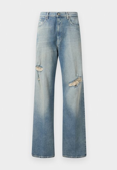 Light blue denim wide-leg jeans featuring distressed rips on front, button closure, and classic five-pocket design. Soft texture.