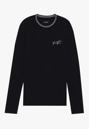 Long-sleeve black t-shirt with a round neckline featuring a white striped collar and small white embroidered text on the chest.