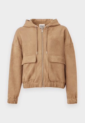 Light brown zip-up hoodie made of soft fabric, featuring two front pockets, a hood, and elasticized cuffs and hem for a comfortable fit.