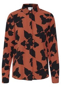 Camicia a maniche lunghe in arancio ruggine con un motivo a foglia nera. Presenta un colletto e chiusura frontale con bottoni. Tessuto testurizzato.