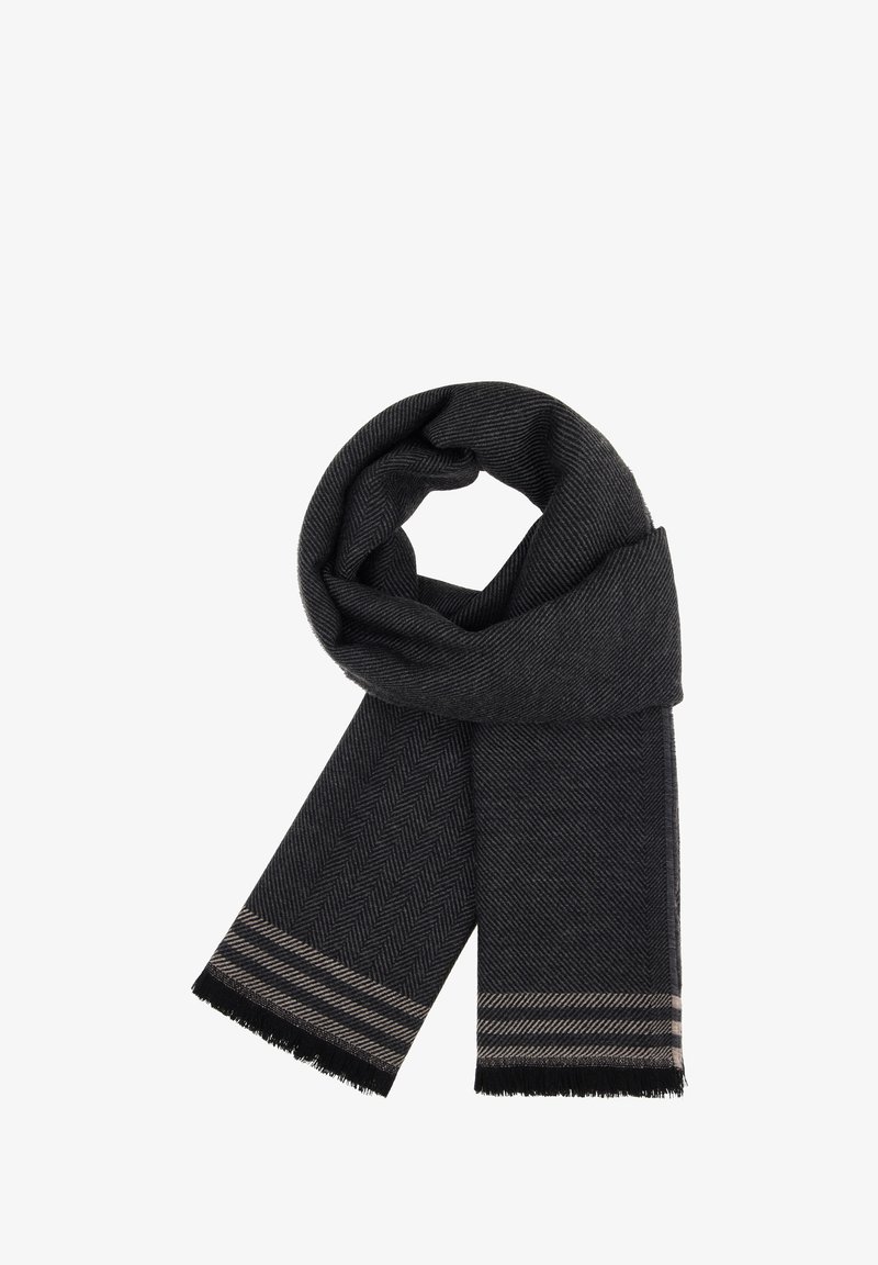 Črn šal s ribjo kostjo, obdelan z resicami. Ima pristrojen svetlo sivo obrobo blizu koncev. Mehka tekstura.