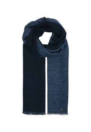 Dark blue scarf with one solid side and one textured checkered side, fringed edges, folded in a loop on a white background.
