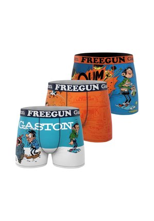 Trois boxers colorés avec une ceinture "FREEGUN" et le personnage de dessin animé Gaston Lagaffe imprimé sur des fonds bleu, orange et turquoise.