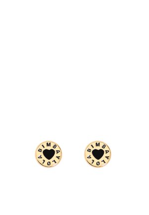 Goudkleurige ronde oorbellen met een zwart hart in het midden, omringd door een verhoogde rand met de opdruk "BIMBA Y LOLA."