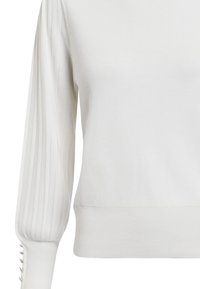 Weiße Strickjacke mit gerippten langen Ärmeln und einem taillierten unteren Saum. Auffällige Knopfakzente an den Ärmelbündchen sorgen für Detailreichtum.