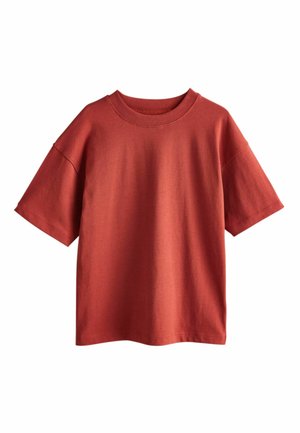 Red short-sleeve t-shirt made of cotton, featuring a round neckline and a relaxed fit. The fabric has a smooth texture and uniform color.