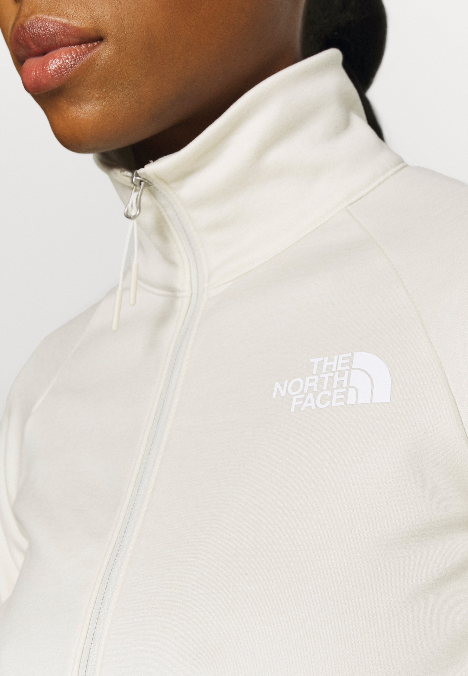 white north face fleece jacket