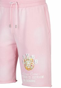 Roze katoenen shorts met een drawstring taille, spettertextuur en kleurraf lion graphic met text in wit en metallic accenten.