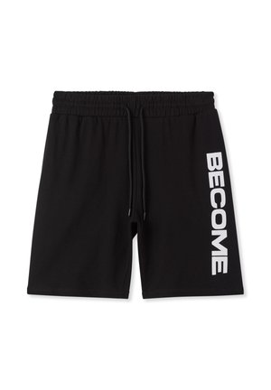 Pantaloncini atletici neri in misto cotone, con vita elasticizzata e coulisse, e la scritta bianca "BECOME" sul lato sinistro.