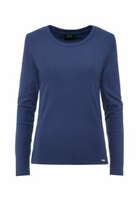 Niebieska, długosleeve, ribbed bluzka z okrągłym dekoltem, z małym metalowym akcentem po lewej stronie u dołu. Wykonana z miękkiego, elastycznego materiału.