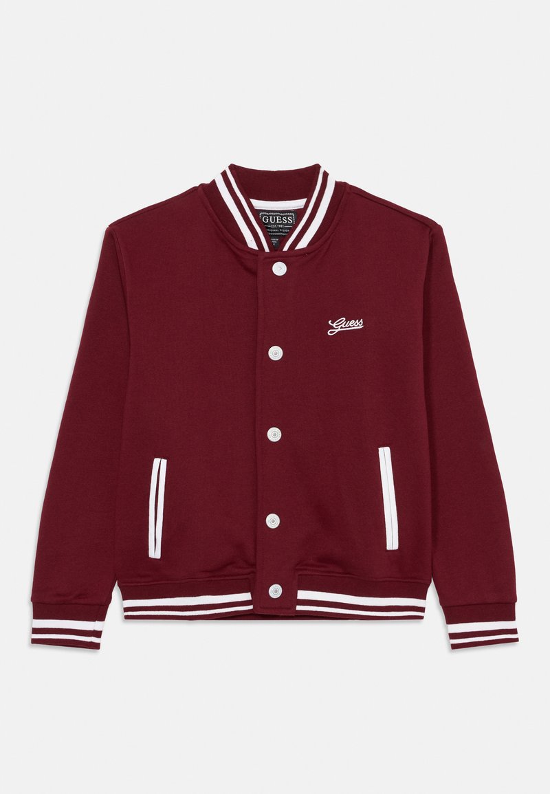 Bordeaux sweatshirt met witte gestreepte geribbelde manchetten en kraag. Voorzien van een sluiting met knopen aan de voorkant en twee zijzakken. Geborduurd logo op de borst.