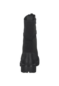 Black ankle boot featuring a smooth leather exterior, textured fabric panels, round toe, and a rugged sole with deep treads.