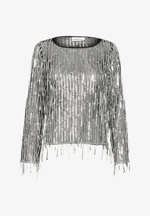 Hopea metallinhohtoinen paita pitkällä hihalla, jossa on roikkuvia nyörimäisiä säikeitä tekstuurin luomiseksi. Pyöreä pääntie, läpinäkyvä materiaali ja kokonaisuutena väljä istuvuus.