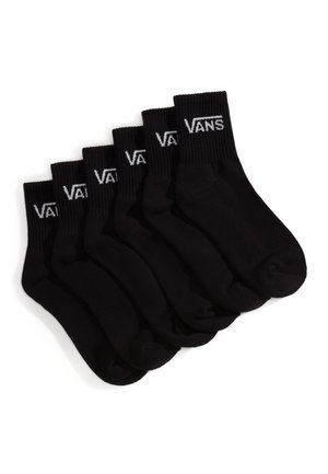 Six pairs of black crew socks with white Vans logo on ribbed cuffs, arranged in a fanned-out stack on a white background.