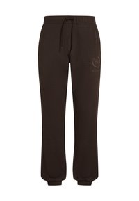 Barna jogger nadrág puha anyagból, rugalmas derékkal, húzózsinórral és rugalmas mandzsettával. Finom logó design található a combján.