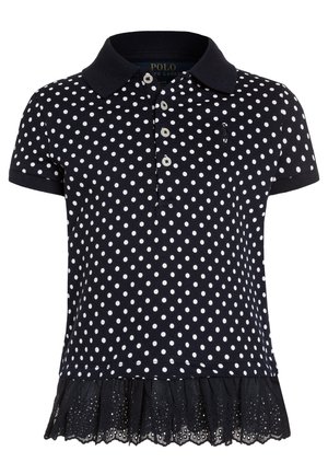 Polo de manga corta azul marino con lunares blancos, tapeta con botones y bajo con volante de encaje negro.