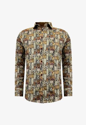 Meer gekleurde blouse met geometrisch patroon in bruin, crème en zwart. Voorzien van lange mouwen en een klassiek kraagontwerp.