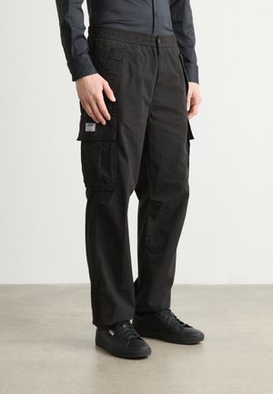 GABIO - Cargo trousers - black