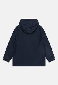 Navy blue hooded rain jacket features a smooth, water-resistant fabric, long sleeves, and elastic cuffs. Plain design with no visible hardware.