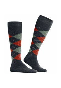 Calze al ginocchio in tessuto grigio scuro con un motivo argyle caratterizzato da forme di diamante rosse, verdi e bianche.