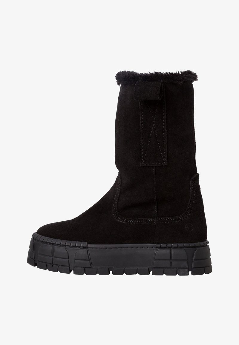 Stivaletti alla caviglia in suede nero con un polsino fluffy, una suola platform nera spessa e cuciture rinforzate lungo i bordi. Design semplice con accenti minimi.