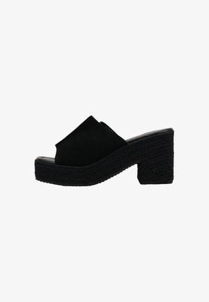 Mule de ante negro con punta abierta, suela con plataforma trenzada y tacón cuadrado, estilo sin cordones, calzado casual de verano para mujer.
