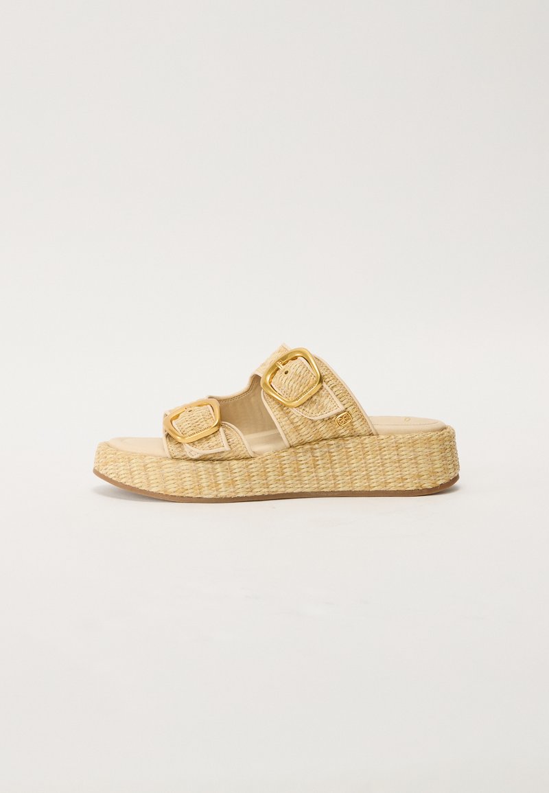 Woven platform sandals in light beige with two adjustable buckles. Textured upper and braided jute sole, providing a casual summer design.