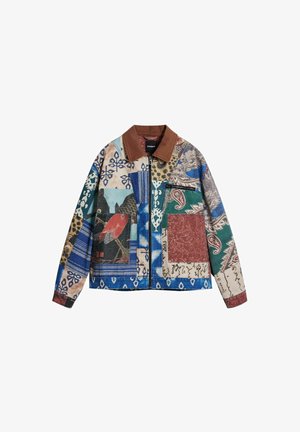 Multicolored jacket featuring a mix of patterns, including floral, paisley, and animal prints. Brown corduroy collar and zippered pocket detail.